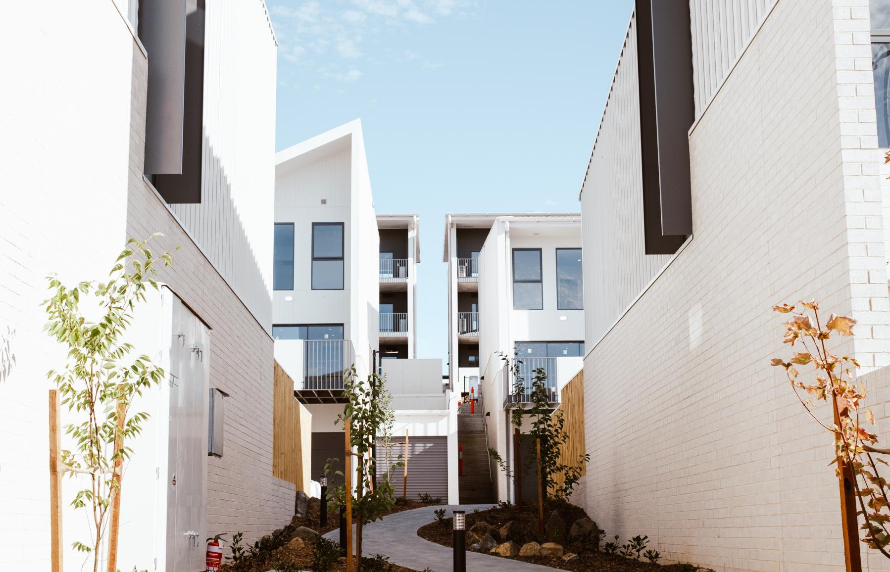 walkway through apartment complex